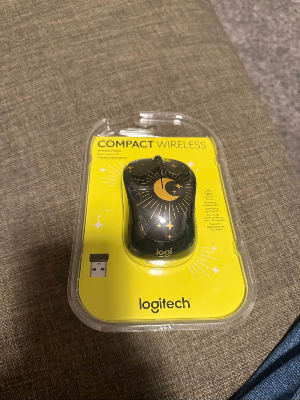 Logitech Wireless Mouse Packaging - Yellow and Clear